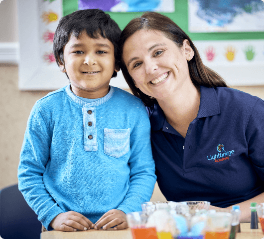 Lightbridge teacher photograph with student